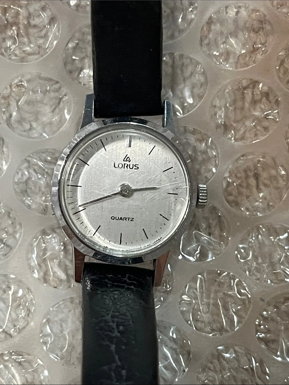 Women's Silver Dial Watch with Black Leather Strap